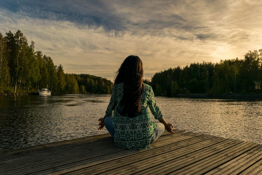 Young woman relaxing with meditation